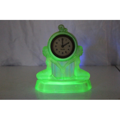 112 - A stunning antique/ Art Deco Mercedes mantle clock in decorative Uranium Glass case, measuring 7