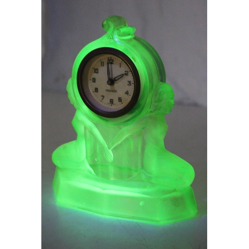 112 - A stunning antique/ Art Deco Mercedes mantle clock in decorative Uranium Glass case, measuring 7