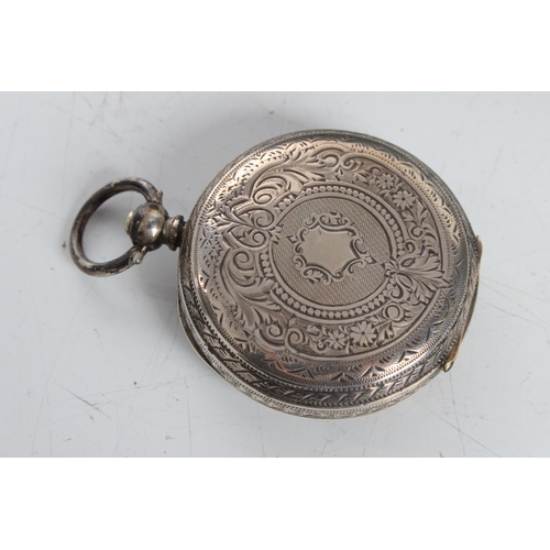 114 - A stunning antique sterling silver cased ladies pocket watch in sterling fronted stand/ case.