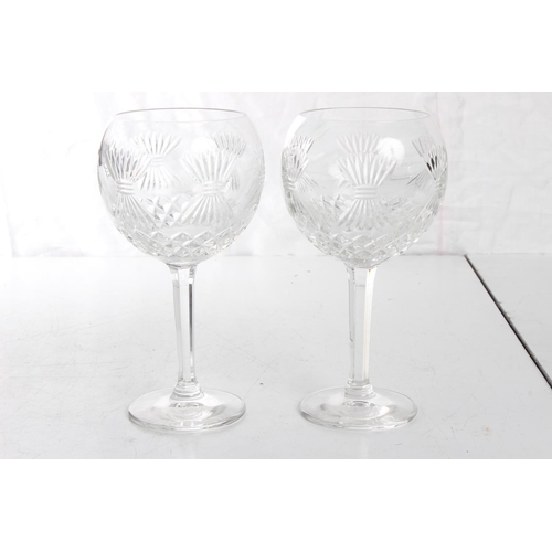 117 - A pair of large Waterford Crystal wine glasses.