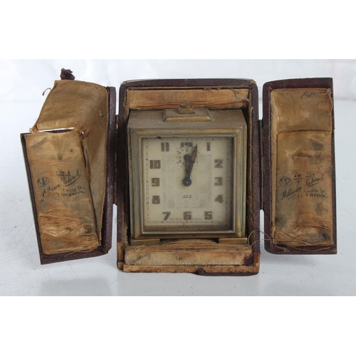 119 - An antique 'Jaz' French made alarm clock in original fitter case (a/f)