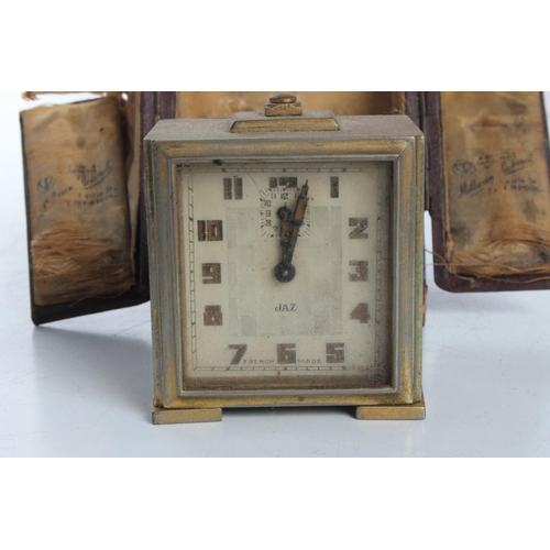 119 - An antique 'Jaz' French made alarm clock in original fitter case (a/f)