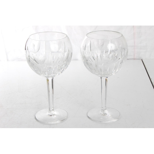 120 - A pair of large Waterford Crystal wine glasses.