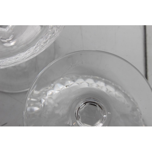 124 - A set of 5 Waterford Crystal champagne saucers.