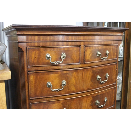 131 - An antique style tallboy/ chest of drawers, measuring 28.5x60x17.5inches.