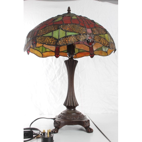 133 - A stunning Tiffany style table lamp with stained glass 'Dragonfly' shade. 17inches diameter.