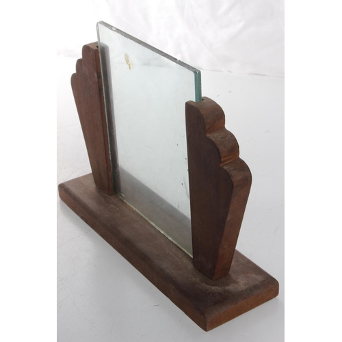 134 - An antique/ Art Deco photo frame with decorative wooden base.