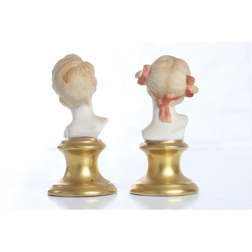 136 - A pair of antique Capodimonte busts, each measuring 7.5cm.