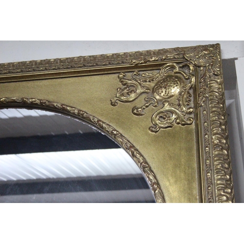 141 - A stunning large mirror with decorative gilt frame, measuring approx 40x49.5inches