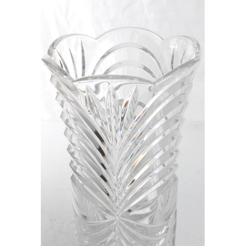 143 - A large decorative crystal vase, measuring 12inches.