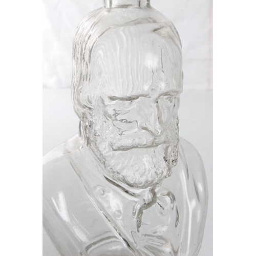 144 - An unusual glass 'bust' decanter. Measuring 12.5inches.