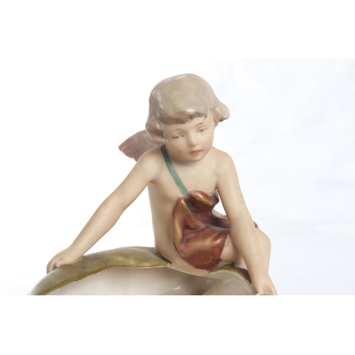 146 - A stunning antique Royal Dux figure, modelled as a Cherub with large shell, stamped 1748 to base. Me... 