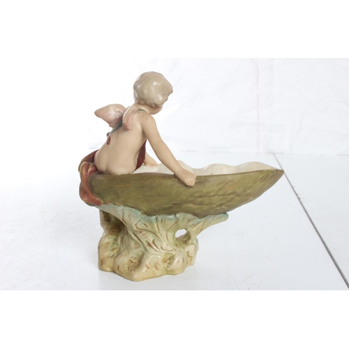 146 - A stunning antique Royal Dux figure, modelled as a Cherub with large shell, stamped 1748 to base. Me... 