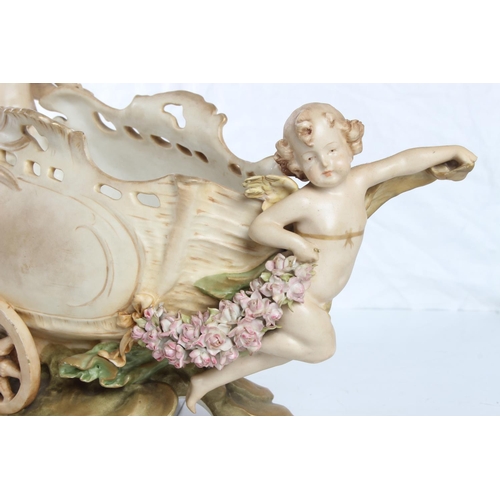 148 - A stunning large Royal Dux flower basket, modelled as an Angel with 2 Cherubs & cart, stamped 4741 t... 