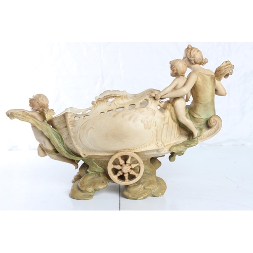 148 - A stunning large Royal Dux flower basket, modelled as an Angel with 2 Cherubs & cart, stamped 4741 t... 