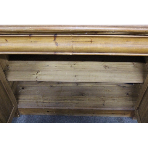 154 - A large modern pine dresser with decorative carved detail, measuring 53x20x48inches.