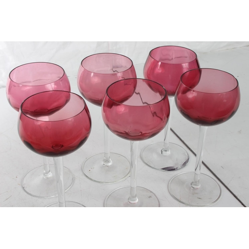 163 - A set of six vintage ruby glass stemmed glasses.