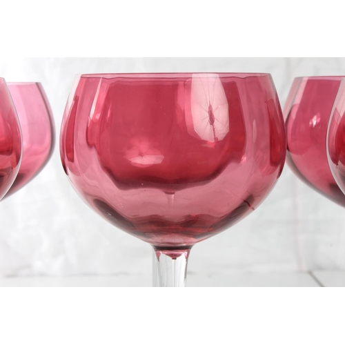 163 - A set of six vintage ruby glass stemmed glasses.