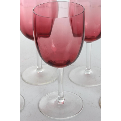 167 - A set of six vintage ruby wine glasses.