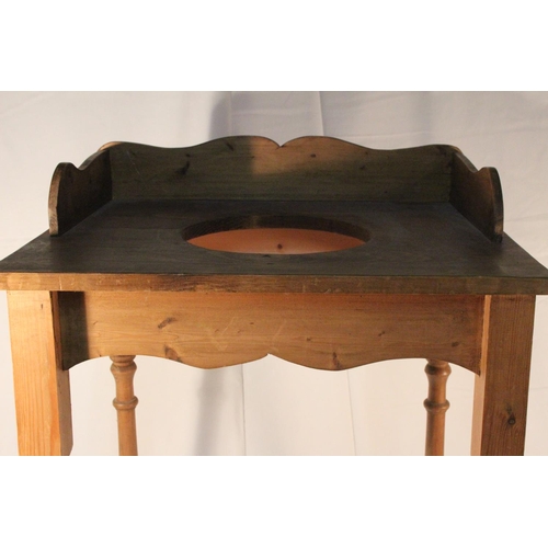 202 - A vintage pine washstand.