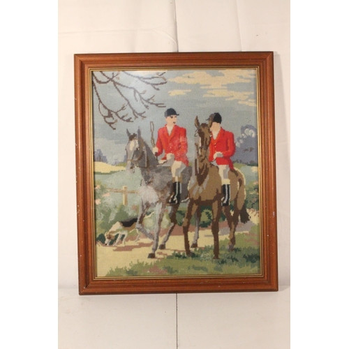 224 - A framed tapestry of a hunting scene.