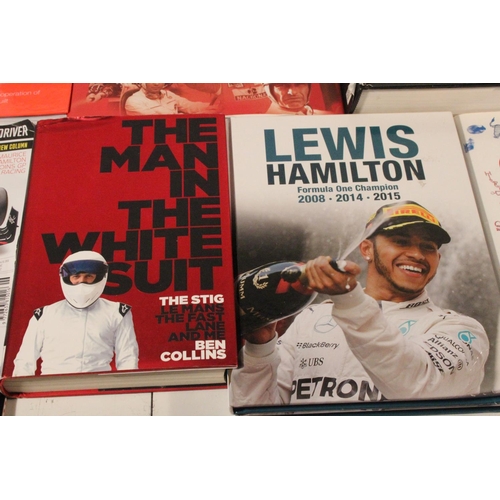 229 - A collection of Formula One racing books and more.