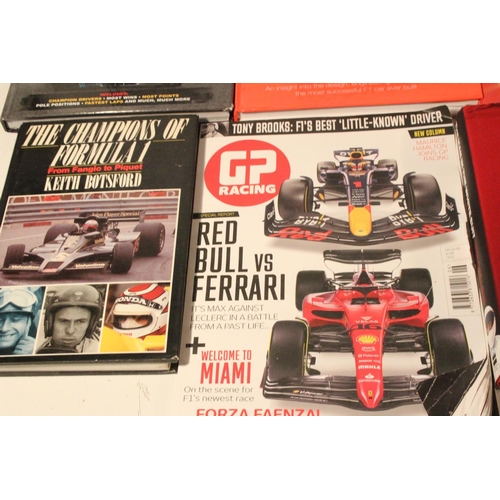 229 - A collection of Formula One racing books and more.