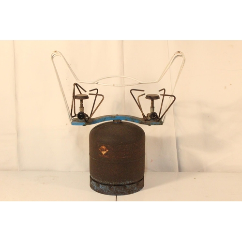 251 - A vintage double burner camping stove.