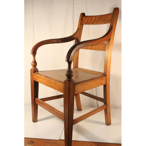 252 - A vintage elm carver chair.