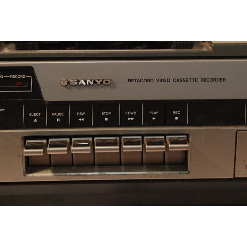 257 - A vintage Sanyo 3 Cord video cassette recorder.