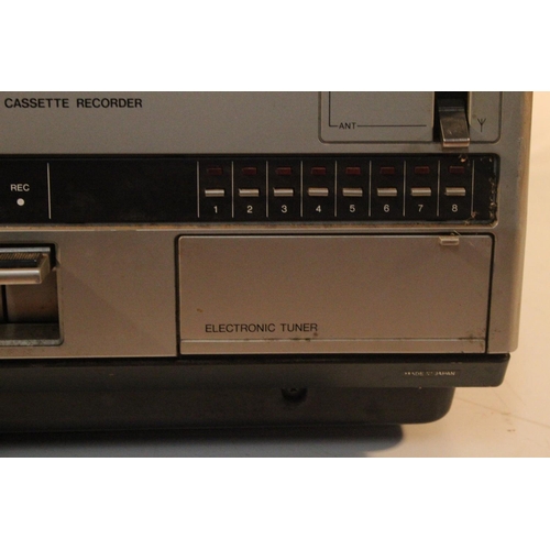 257 - A vintage Sanyo 3 Cord video cassette recorder.