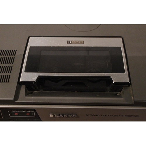 257 - A vintage Sanyo 3 Cord video cassette recorder.