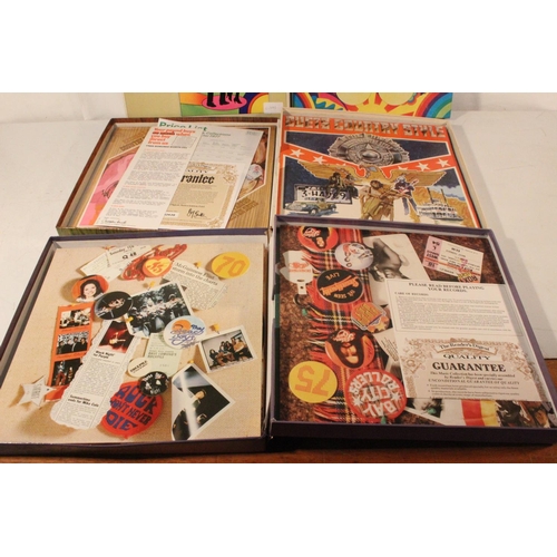 258 - Four boxed sets of vintage records/albums to include The Fabulous Fifties, The Sensational 70's and ... 