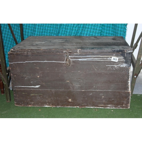 262 - A vintage wooden storage trunk.