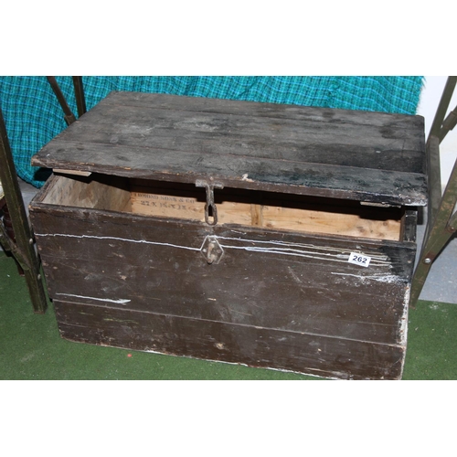 262 - A vintage wooden storage trunk.