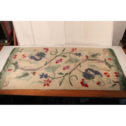 269 - A handmade vintage rug.