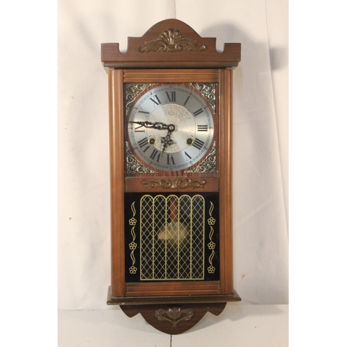 271 - A vintage 31 day wall clock.