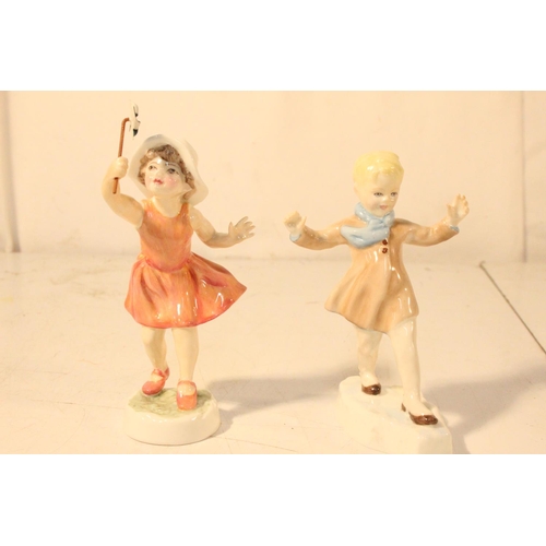 292 - Two Royal Worcester figurine titled The Slide and Let's Run modelled by F G Doughty.