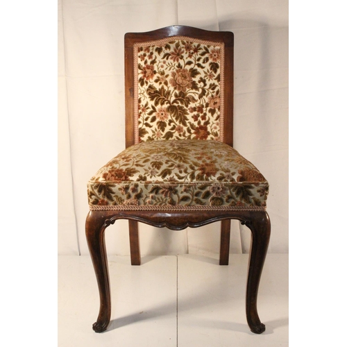 298 - A vintage upholstered chair.