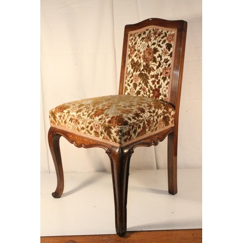 298 - A vintage upholstered chair.