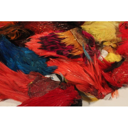 415 - A large lot of assorted dyed fly tying feathers.