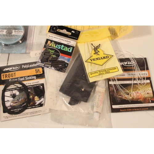 423 - A job lot of fishing accessories to include a Lureflash Strike Indicator, a pack of Fluorocarbon, a ... 