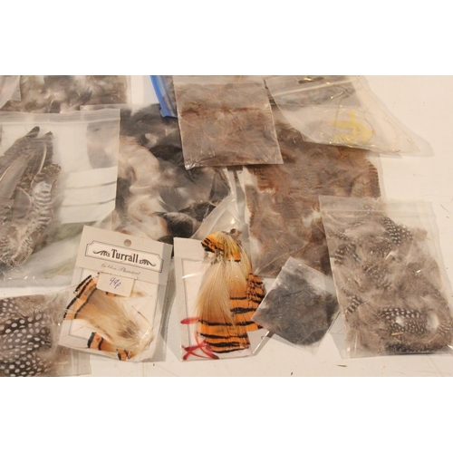 431 - A lot of individual bagged fly tying feathers and more.