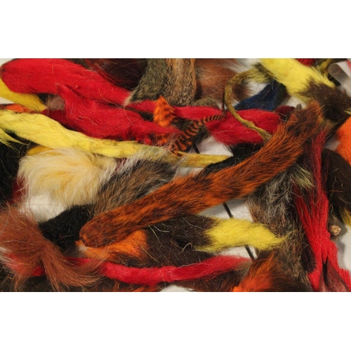 434 - A large lot of dyed fly tying tail fur.