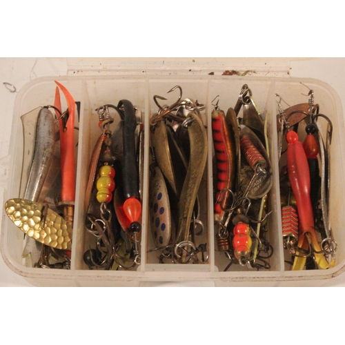 553 - A box of assorted fishing lures.