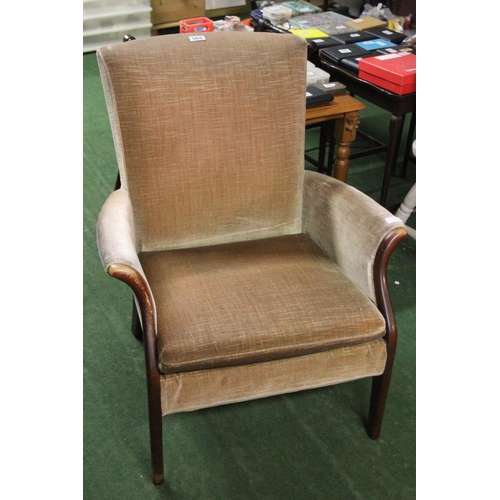 565 - A Parker Knoll armchair.