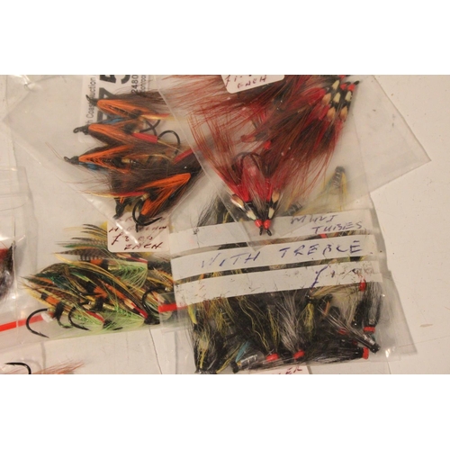 575 - A lot of assorted packs of fishing flies.