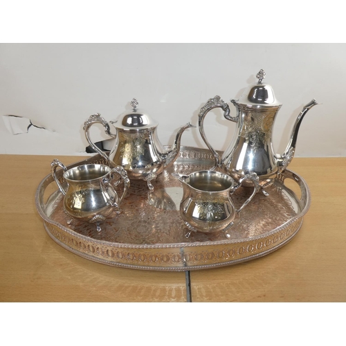 302 - A vintage four piece EPNS tea service and tray.