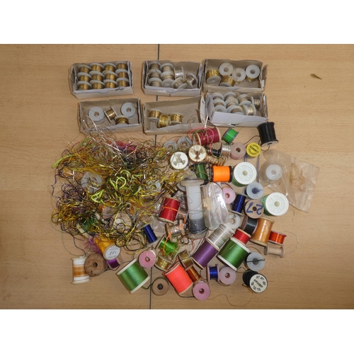 324 - A large lot of assorted tinsel spools and more.