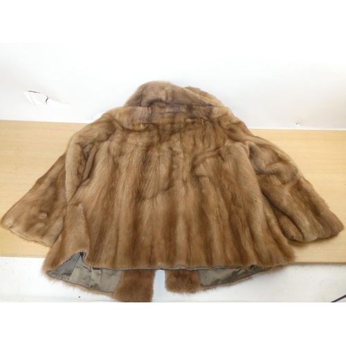 329 - A vintage Morgan fur coat.